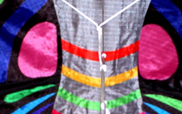 close up of string details on rainbow butterfly single line kite